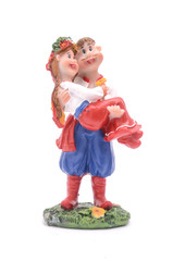 Ukrainian man and woman figurine isolated on white