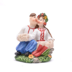 Ukrainian man and woman figurine isolated on white