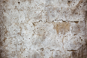 Rough concrete texture of cracked plaster