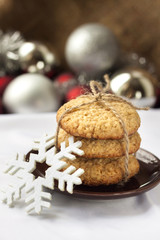Fototapeta na wymiar Homemade oat cookies baked for New Year holidays