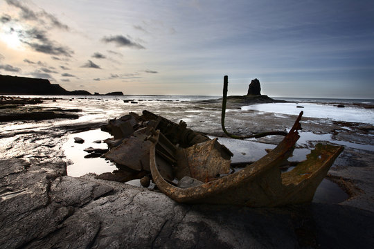 Old wreck and Black Nab at Saltwick Bay, near Whitby, North Yorkshire, Yorkshire