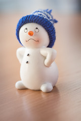 Cute Snowman on Wooden Table