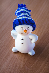 Cute Snowman on Wooden Table