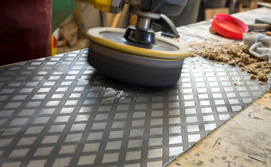 Metal grinding on steel plate