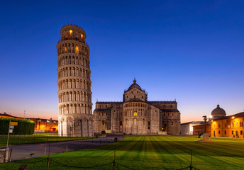 Night view of Pisa Cathedral (Duomo di Pisa) with the Leaning Tower of Pisa (Torre di Pisa) on Piazza dei Miracoli in Pisa, Tuscany, Italy - obrazy, fototapety, plakaty
