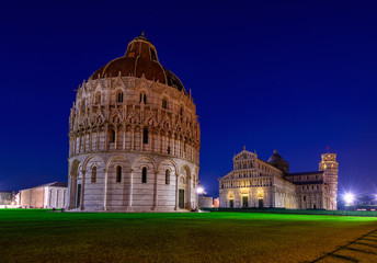 Baptistery of St. John (Battistero di San Giovanni di Pisa), Pisa Cathedral (Duomo di Pisa) with Leaning Tower of Pisa (Torre di Pisa) on Piazza dei Miracoli in Pisa at night, Tuscany, Italy