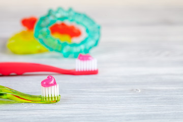 prevention and care children's teeth wooden background top view