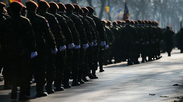 Detail with troops march during a military parade