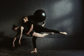 Fototapeta na wymiar Involved ballet dancers having the rehearsal