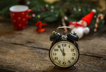 Vintage alarm clock on christmas background