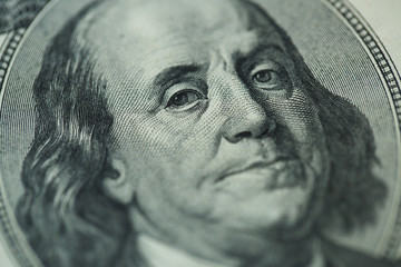 Benjamin Franklin's portrait on one hundred dollar bill