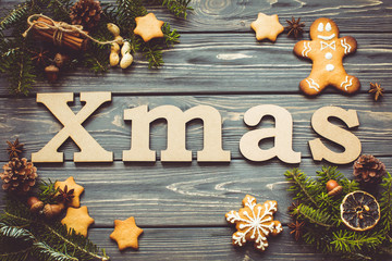 Christmas Time. Simple wooden background with letters and decor
