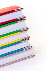 Multicolored book textile cover. Photobooks on a white background.