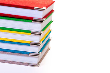 Multicolored book textile cover. Photobooks on a white background.