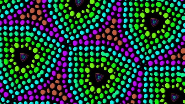 Colorful peas building in rotation geometric kaleidoscope patterns on black background, seamless abstract video