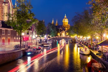 Gordijnen Night red-light district De Wallen, canal, Basilica of Saint Nicholas and bridge, Amsterdam, Holland, Netherlands. Long exposure. Used toning © Kavalenkava
