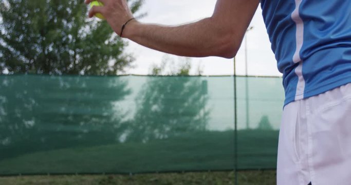 Slow Motion Of Tennis Player Throwing And Catching Tennis Ball