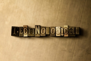 TECHNOLOGICAL - close-up of grungy vintage typeset word on metal backdrop. Royalty free stock illustration.  Can be used for online banner ads and direct mail.