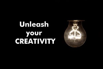 Bulb with message UNLEASH YOUR CREATIVITY