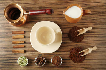 Coffee composition on wooden background