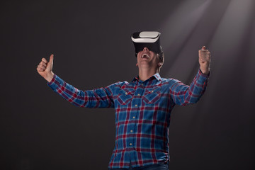 cyberspace and people concept - happy young man with virtual rea