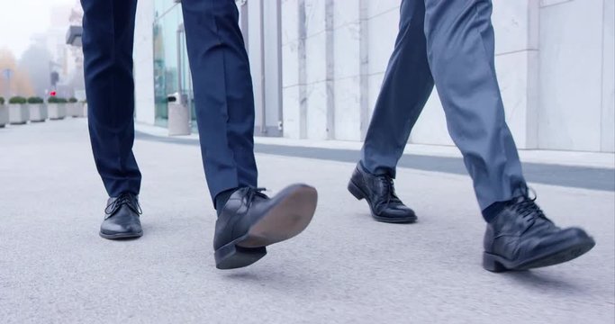 Business Men Walking Together In Nice Shoes