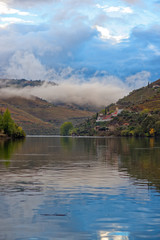 Fototapeta na wymiar river landscapes with low clouds