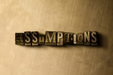 Fototapeta premium ASSUMPTIONS - close-up of grungy vintage typeset word on metal backdrop. Royalty free stock illustration. Can be used for online banner ads and direct mail.