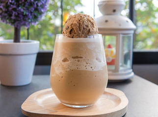 frappe mocha with ice cream in glass at coffee cafe