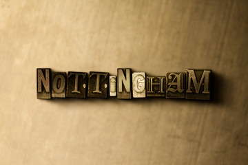 Fototapeta na wymiar NOTTINGHAM - close-up of grungy vintage typeset word on metal backdrop. Royalty free stock illustration. Can be used for online banner ads and direct mail.