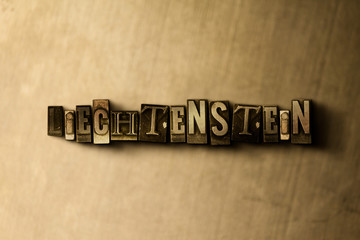 Fototapeta na wymiar LIECHTENSTEIN - close-up of grungy vintage typeset word on metal backdrop. Royalty free stock illustration. Can be used for online banner ads and direct mail.