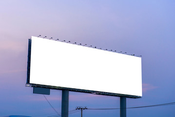 Blank billboard ready for new advertisement with sunset backgrou