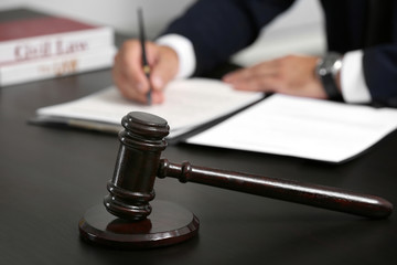 Judge gavel on table, closeup