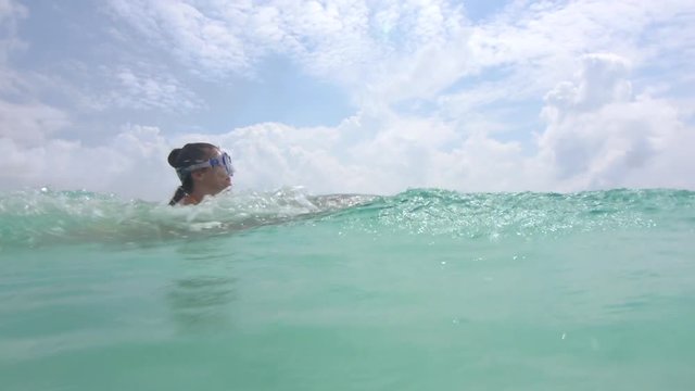 Women Friends Having Fun Drifiting With Jets In Sea