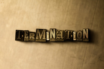 TERMINATION - close-up of grungy vintage typeset word on metal backdrop. Royalty free stock illustration.  Can be used for online banner ads and direct mail.