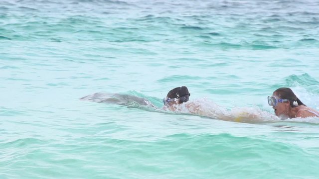 Sporty Women Tourists Ride Small Jets In Open Sea