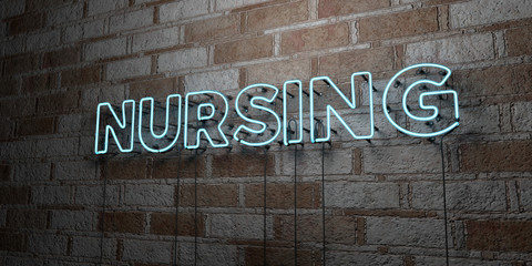 NURSING - Glowing Neon Sign on stonework wall - 3D rendered royalty free stock illustration.  Can be used for online banner ads and direct mailers..