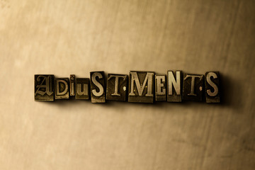Naklejka premium ADJUSTMENTS - close-up of grungy vintage typeset word on metal backdrop. Royalty free stock illustration. Can be used for online banner ads and direct mail.