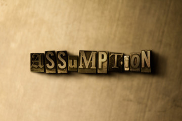 ASSUMPTION - close-up of grungy vintage typeset word on metal backdrop. Royalty free stock illustration.  Can be used for online banner ads and direct mail.