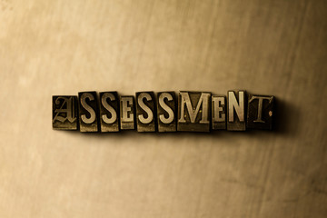 ASSESSMENT - close-up of grungy vintage typeset word on metal backdrop. Royalty free stock illustration.  Can be used for online banner ads and direct mail.