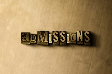 ADMISSIONS - close-up of grungy vintage typeset word on metal backdrop. Royalty free stock illustration.  Can be used for online banner ads and direct mail.