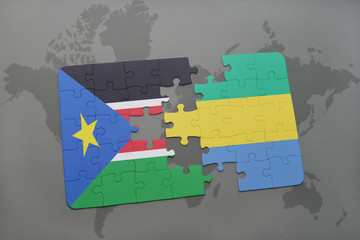 puzzle with the national flag of south sudan and gabon on a world map