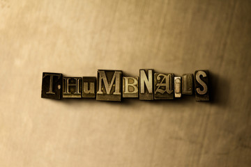 THUMBNAILS - close-up of grungy vintage typeset word on metal backdrop. Royalty free stock illustration.  Can be used for online banner ads and direct mail.