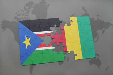 puzzle with the national flag of south sudan and guinea on a world map