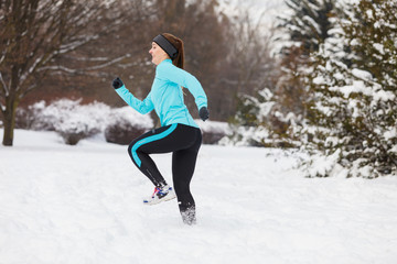 Young lady doing workout in park.