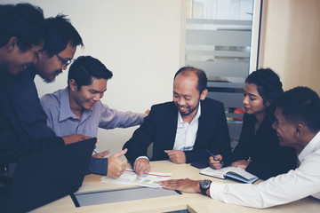 smart business team discussing ideas and planning about business profits at meeting room of office