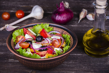 Fresh vegetable greek salad on the table