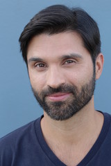 Fototapeta premium Playful male frowning close up