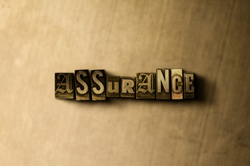 ASSURANCE - close-up of grungy vintage typeset word on metal backdrop. Royalty free stock illustration.  Can be used for online banner ads and direct mail.