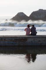 Twosome: couple on the ruins of Sutro Baths in San Francisco, USA